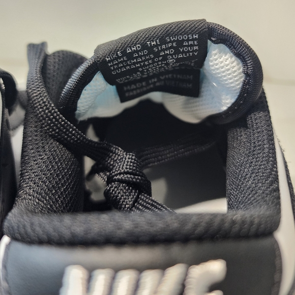 Nike Dunk Low RETRO Black / White Panda Women's - Picture 5 of 9